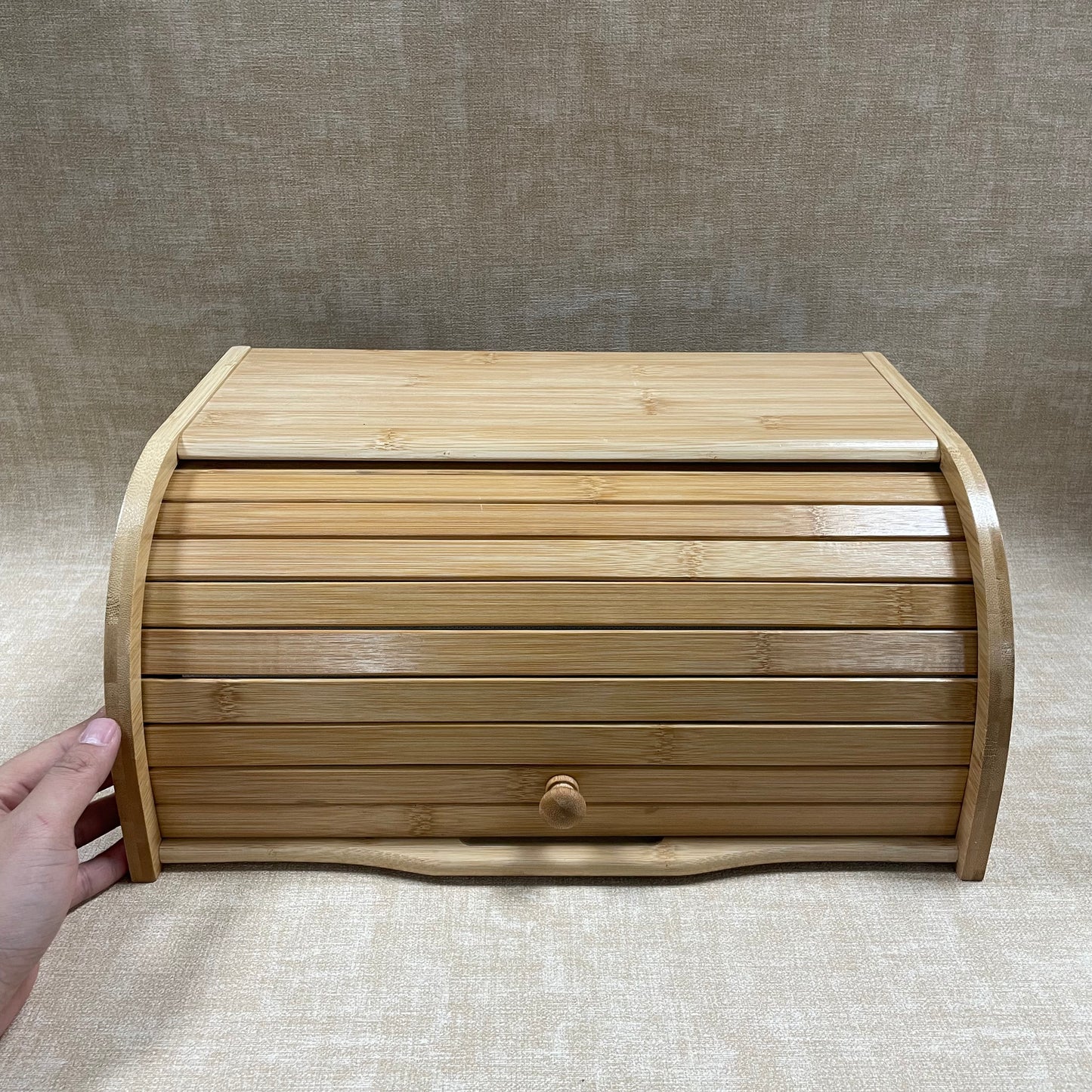 Molvix bamboo bread box offers a stylish and eco-friendly storage solution, keeping your bread and cookies fresh while adding a touch of natural elegance to your kitchen.