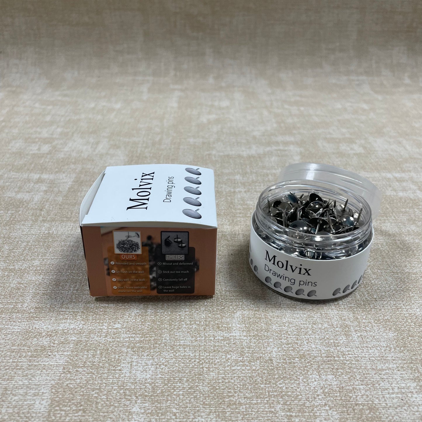 Molvix drawing pins are top-notch, durable metal pins housed in a handy round container, perfect for effortlessly securing your notes, photos, or papers in place.