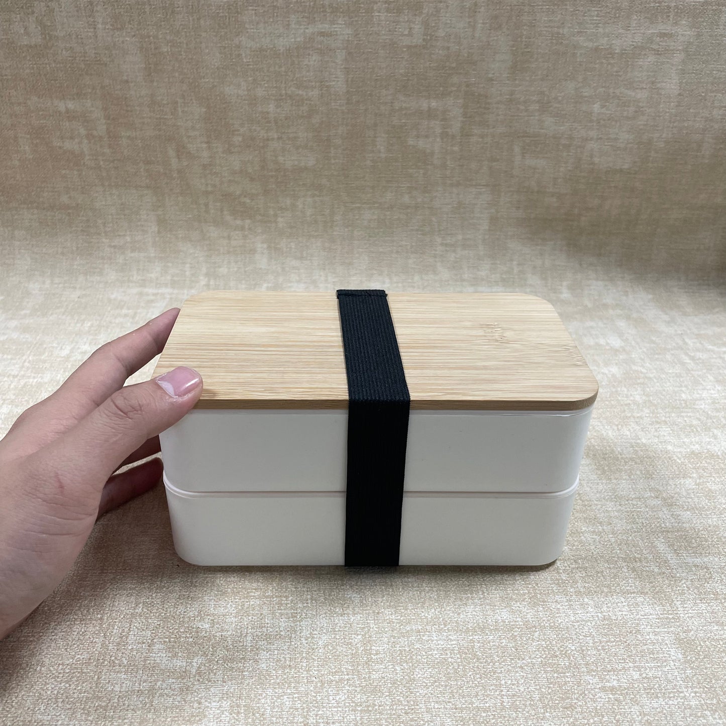 Molvix bamboo lunch box is an eco-friendly, leak-proof, and portable food container that comes with a complete cutlery set, making it perfect for enjoying fresh meals anywhere.