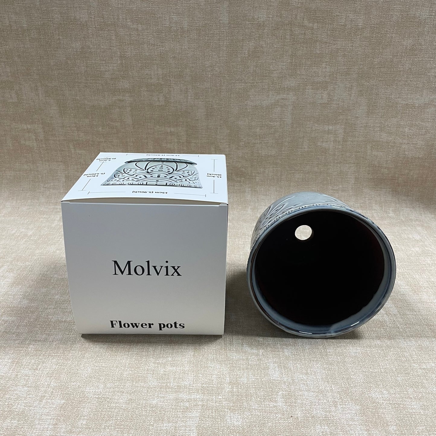Molvix flower pot boasts a weatherproof, sleek, and chic design with exquisite patterns, making it a versatile and stylish choice for showcasing your favorite plants.