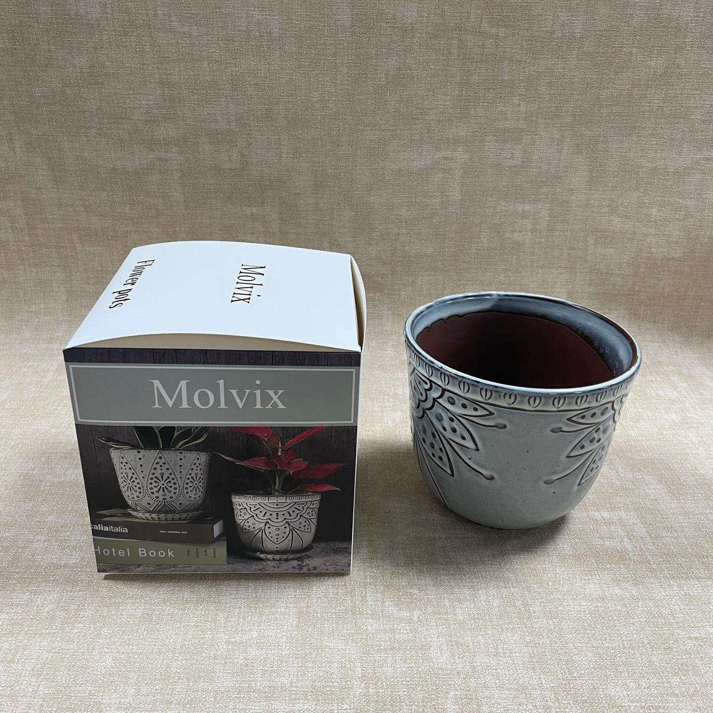 Molvix flower pot boasts a weatherproof, sleek, and chic design with exquisite patterns, making it a versatile and stylish choice for showcasing your favorite plants.