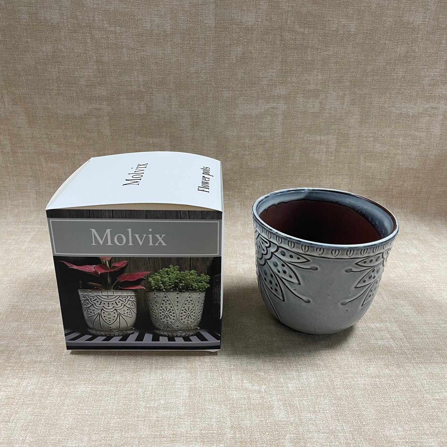 Molvix flower pot boasts a weatherproof, sleek, and chic design with exquisite patterns, making it a versatile and stylish choice for showcasing your favorite plants.