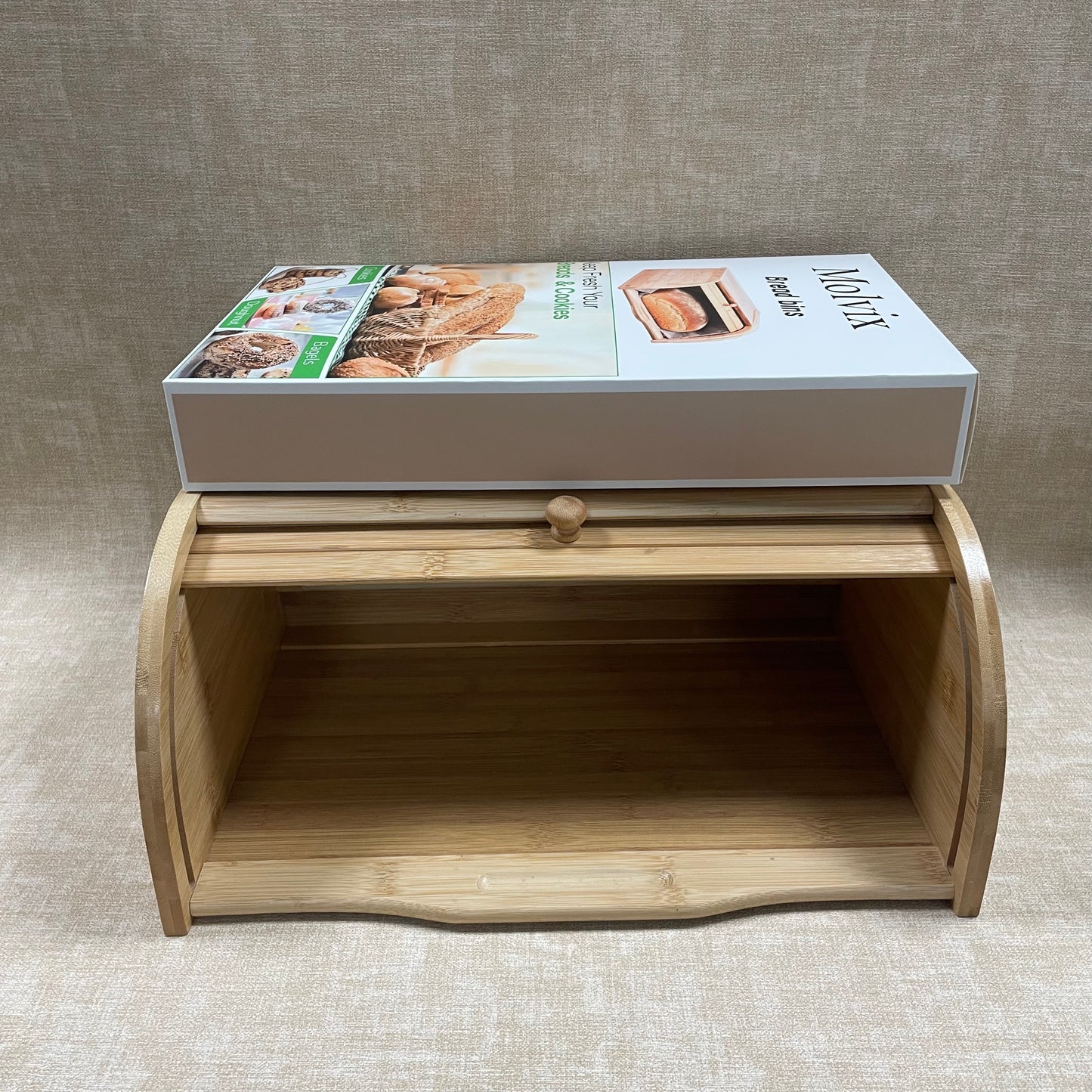 Molvix bamboo bread box offers a stylish and eco-friendly storage solution, keeping your bread and cookies fresh while adding a touch of natural elegance to your kitchen.