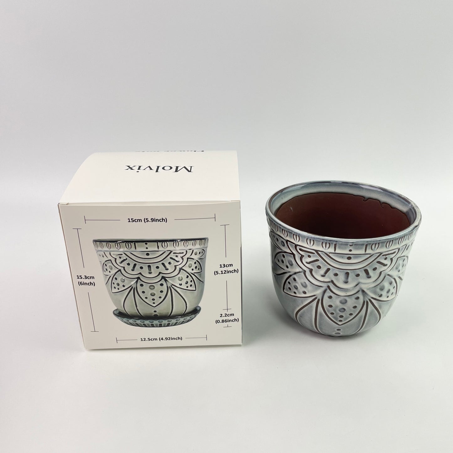 Molvix flower pot boasts a weatherproof, sleek, and chic design with exquisite patterns, making it a versatile and stylish choice for showcasing your favorite plants.